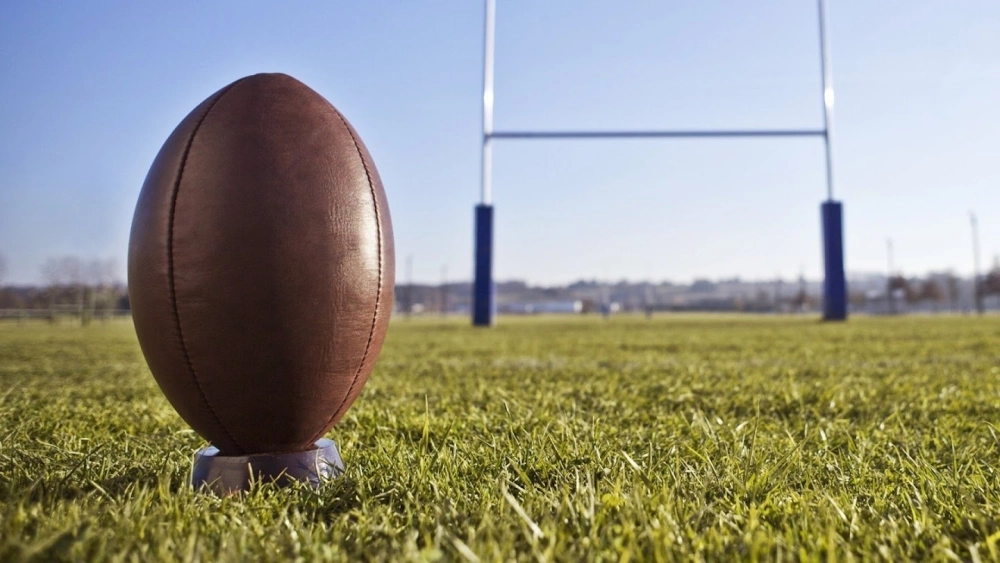 Hình nền bóng bầu dục truyền cảm hứng thi đấu